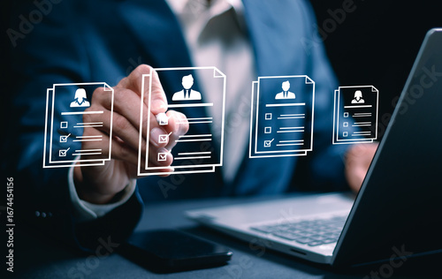 Human resource technology, HR recruitment and team management, Human resource manager reviewing online CVs to select perfect candidate for employment using digital technology and networking tools
