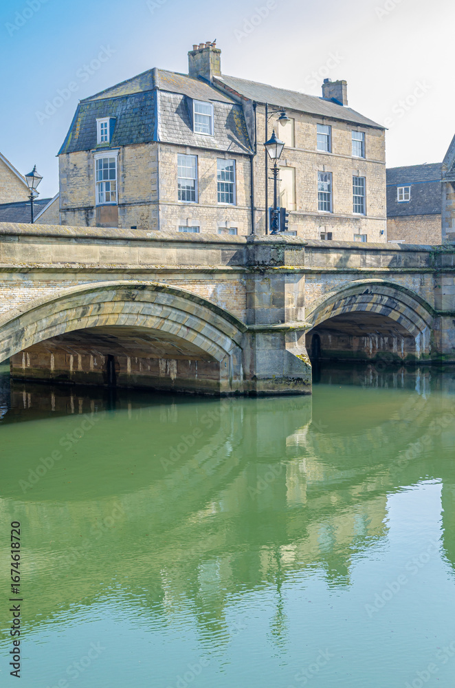 Naklejka premium Buildings on the bank of the River Welland in Stamford, UK