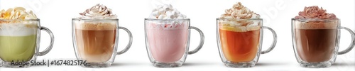 Four different types of hot beverages in clear glass mugs, topped with whipped cream