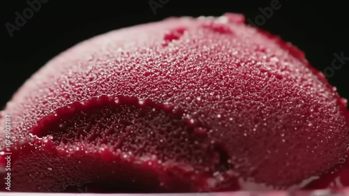 Close up view of scoop of red gelato