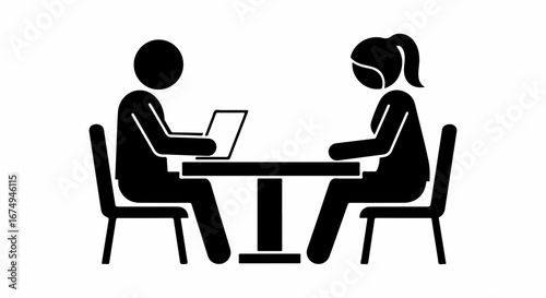 Simple icon of a man and woman having a meeting at a table with a laptop.