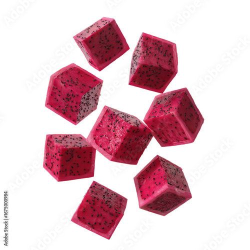Scattered cubes of vibrant pink dragon fruit isolated on transparent background