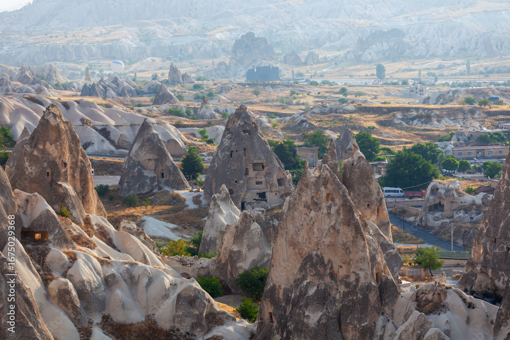 Naklejka premium Majestic landscape of Cappadocia’s fairy chimneys, the region’s stunning geological wonders, place of residence of ancient Christians
