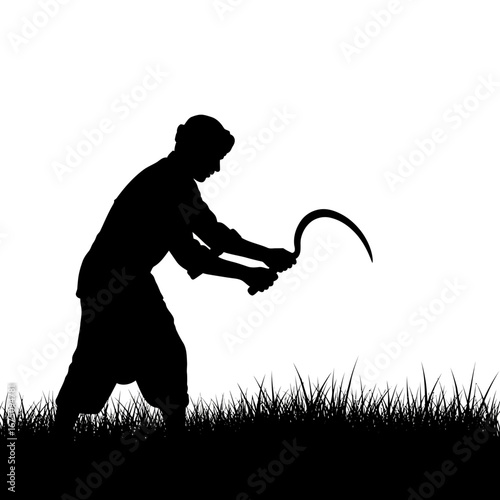 silhouette of a man cutting gras