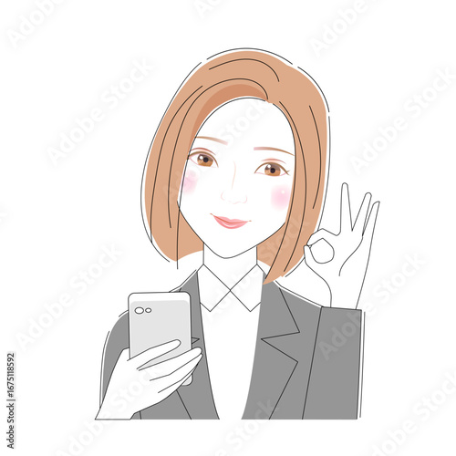 スマホを見てOKサインをする女性