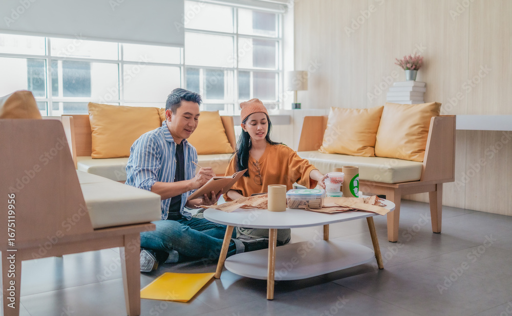 Obraz premium Startup Founders Testing Eco Packaging Ideas