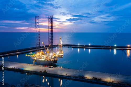 Wallpaper Mural Aerial view of offshore jack up rig in a shipyard during sunset for oil and gas exploration and production. Torontodigital.ca