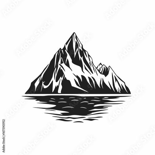Dramatic mountain range reflected on a lake in black silhouette