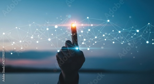 Finger touches a glowing, networked connection against a twilight sky