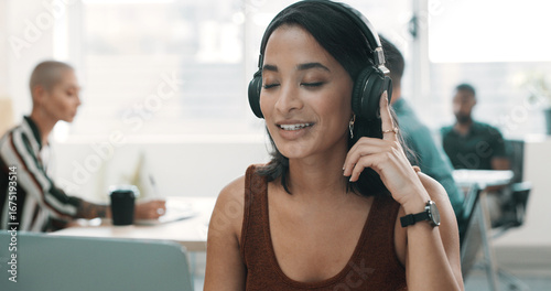 Fotografie Headphones, laptop and relax with business woman in office streaming service, stress relief audio and white noise
