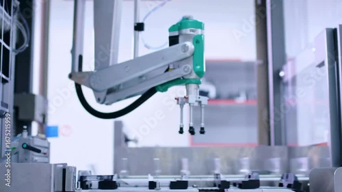 Automated machinery operates in a pharmaceutical facility, demonstrating the integration of robotics in drug production. Precision and speed are enhanced, improving product output.