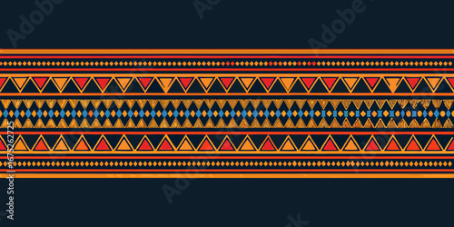 Vibrant geometric tribal pattern with triangles diamonds and stripes on dark blue background