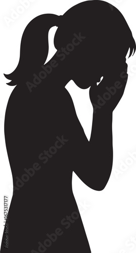 Silhouette of a woman in distress with her head in her hands