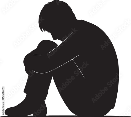 Sad person sitting in a fetal position silhouette