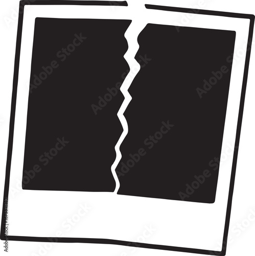 A torn instant photograph with a jagged rip down the middle