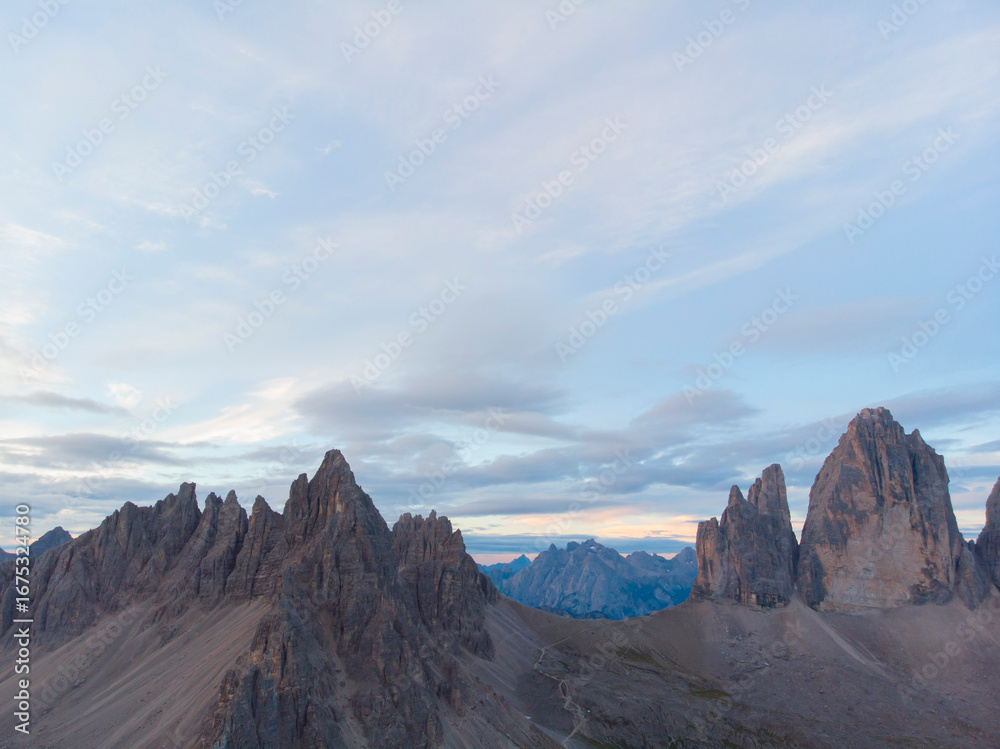 Obraz premium The Tre Cime di Lavaredo (Three Peaks of Lavaredo), located in the heart of the Dolomites