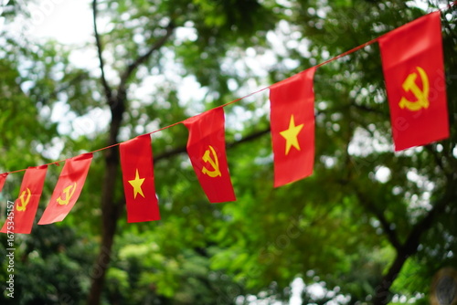 Hanging Vietnamese national flag displayed to celebrate the 80th anniversary of Vietnam National Day, September 2, 2025, marking the historic milestone with the A80 military parade in Hanoi. 