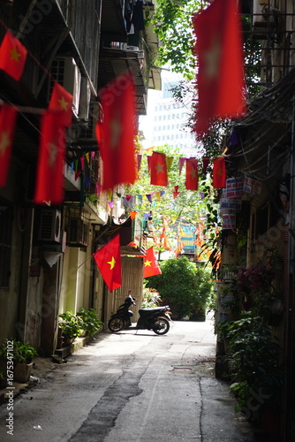 Hanging Vietnamese national flag displayed to celebrate the 80th anniversary of Vietnam National Day, September 2, 2025, marking the historic milestone with the A80 military parade in Hanoi. 