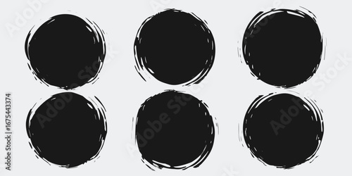 Six black grunge circles with rough edges on a white background