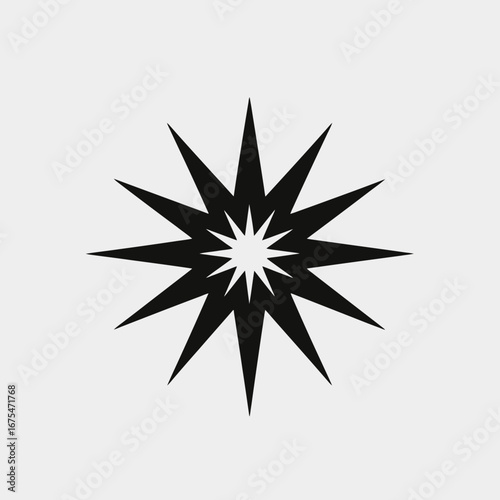 Abstract geometrical starburst design with jagged lines forming a black silhouette