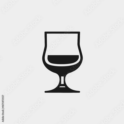 Elegant cognac snifter with dark liquor minimalism, creating a refined silhouette