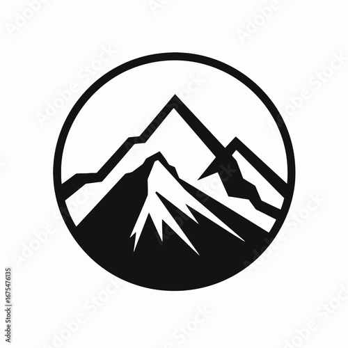 Majestic mountain peaks within a circular frame create a stunning silhouette