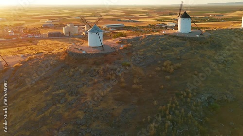 Aerial view of the windmills of Consuegra at sunrise, Castilla-La Mancha, Spain.