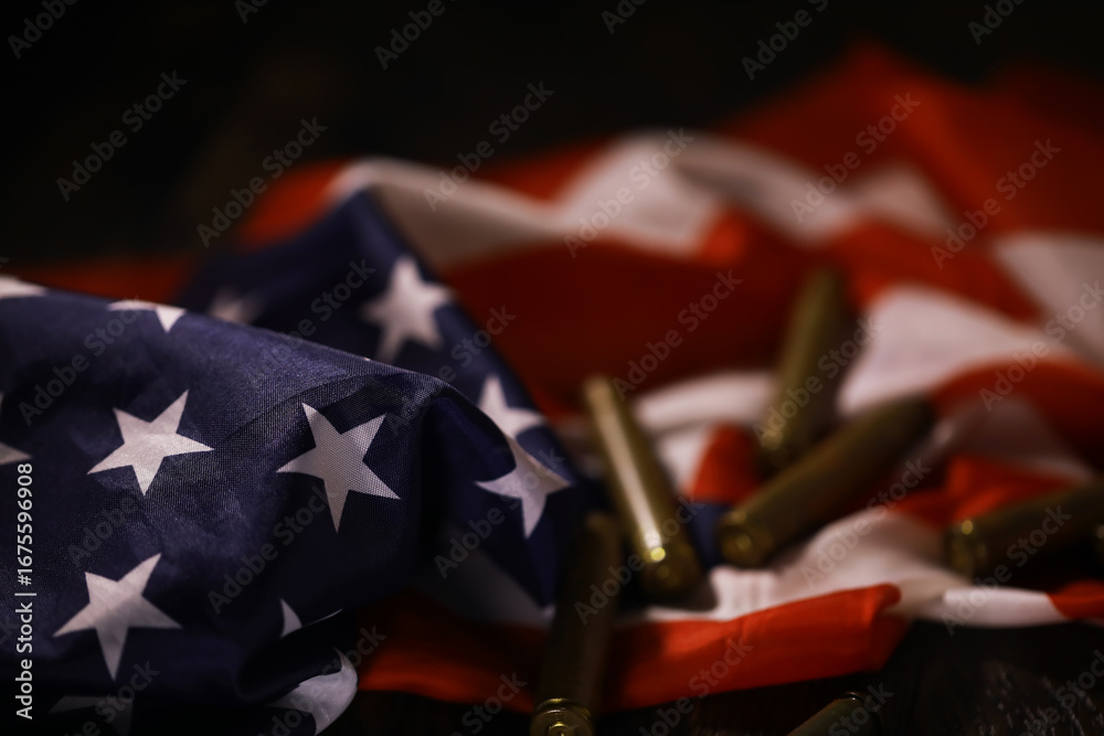 Naklejka premium American Flag with Bullet Casings: Symbolizing Patriotism and Gun Violence in the USA