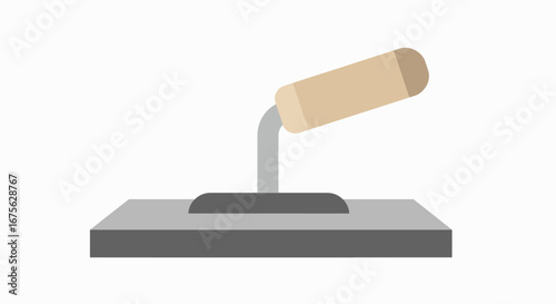 A close-up view of a hand-held smoothing tool.