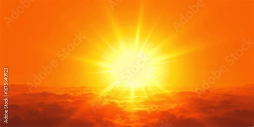 Orange sun setting over the blue mountain landscape with dramatic clouds