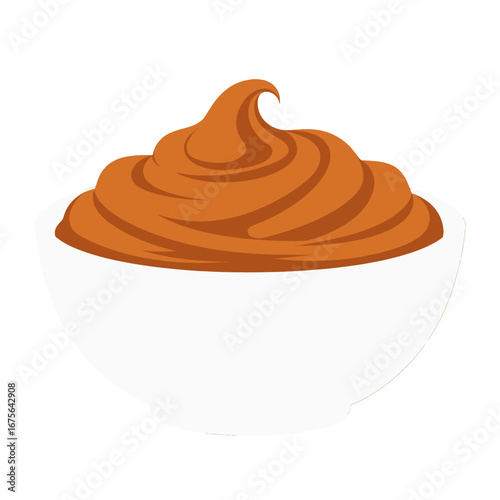 A white bowl filled with a rich, caramel-colored sauce, displaying swirls and peaks, against a black backdrop.
