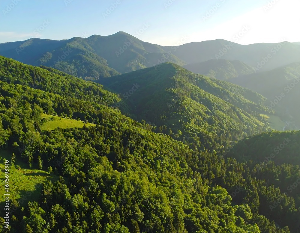 Fototapeta premium Lush green mountain range panorama