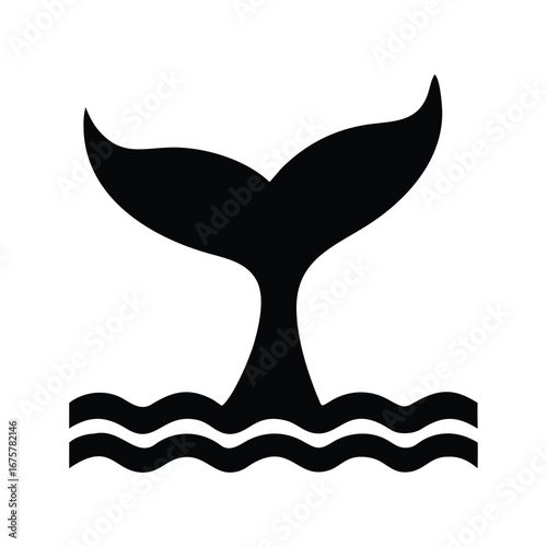 Black silhouette of a whale tail fin emerging from wavy water