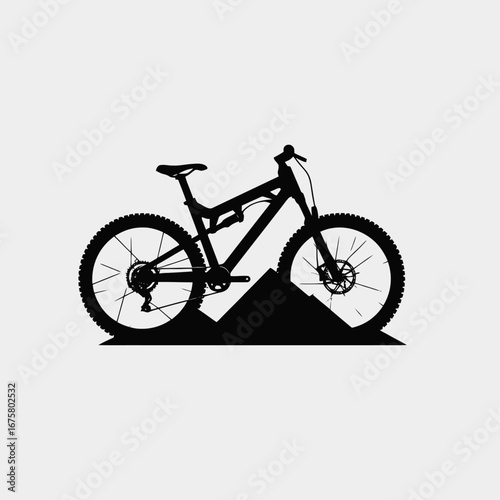 Striking mountain bike illustration atop hills with captivating vector graphic silhouette
