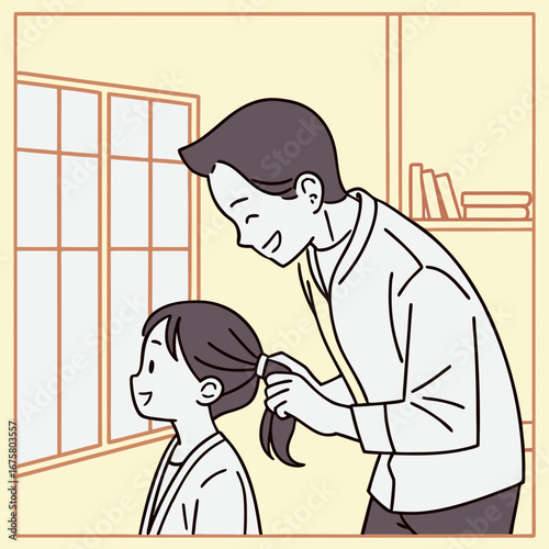 Father tidying up child hair tie