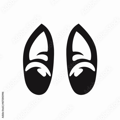 Unique black footprints graphic design with animalistic paw-like details creating a silhouette