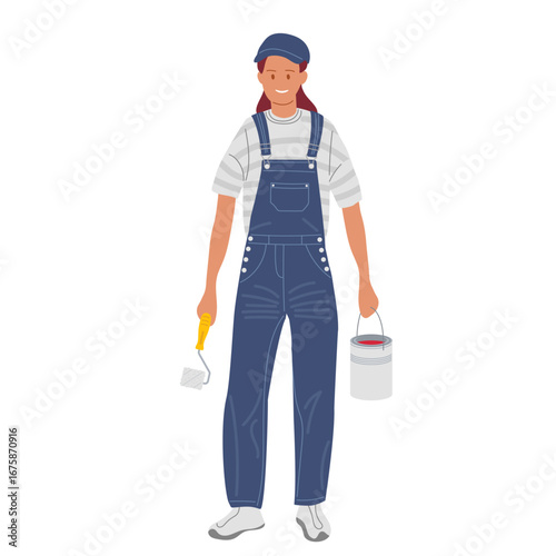 Young woman in overalls preparing to paint at home on a sunny day