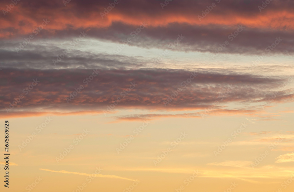 Fototapeta premium Colorful dramatic sunset sky with clouds.