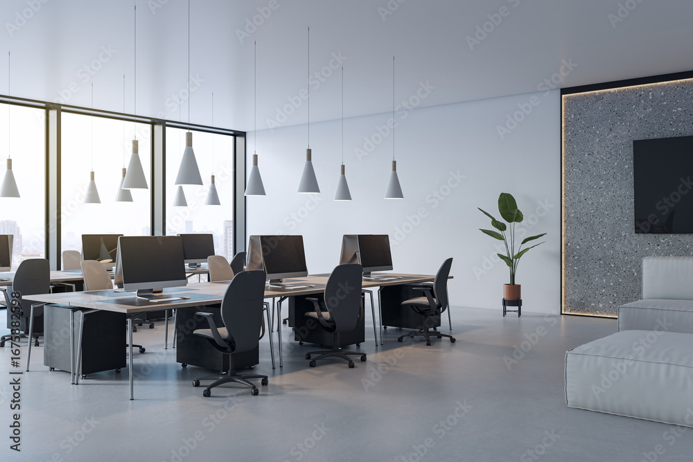 Fototapeta premium Modern spacious office interior with large desks, ergonomic chairs, pendant lights, and city view through glass windows in daytime setting. 3D Rendering