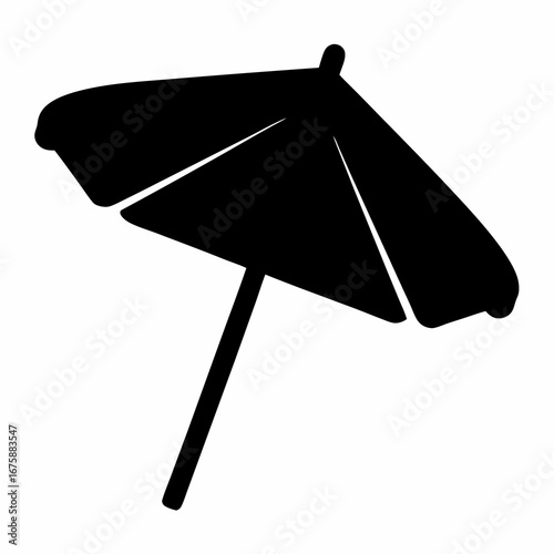 Silhouette of a beach umbrella providing shade on a sunny day