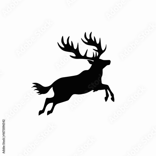 Majestic reindeer jumps gracefully with intricate antlers in stark black silhouette