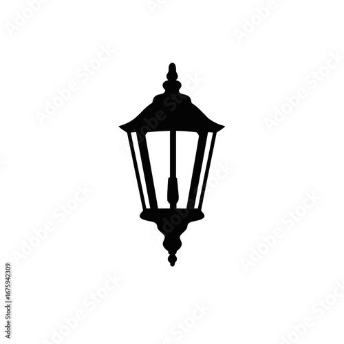 Elegant vintage gas street lamp on white background creates a silhouette