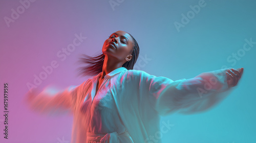 young black woman dancing in white, colorful lights, blurred style