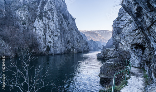 Matka Macedonia - A Calm river between high rocky cliffs in winter.