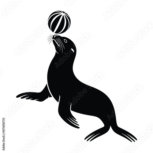 Silhouette of a trained seal balancing a ball on its nose