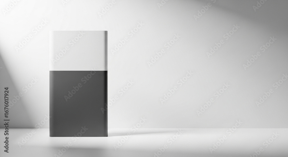Fototapeta premium A simple 3D illustration of a modern product package in front of a wall is shown. The package is a dark gray with a white top.