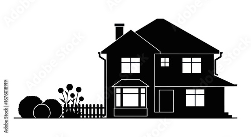Silhouette of a Two-Story House with Garden.