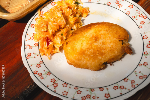 Fototapeta Naklejka Na Ścianę i Meble -  Farszynka - stuffed potato cutlets, a Polish delicacy from Warmia and Mazury. Potato dough filled with meat and vegetables.