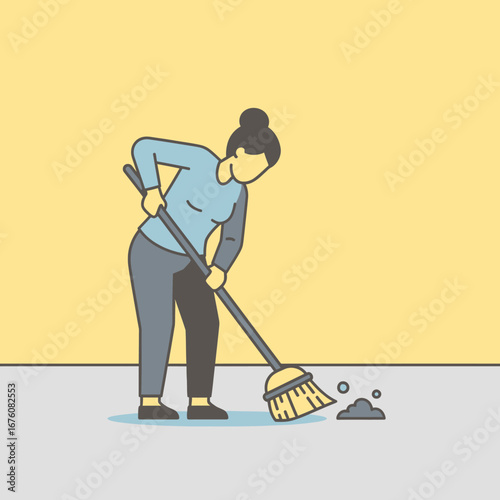 A woman is sweeping the floor with a broom.