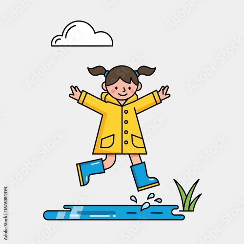 A happy young girl in a yellow raincoat and blue boots jumps into a puddle on a cloudy day.